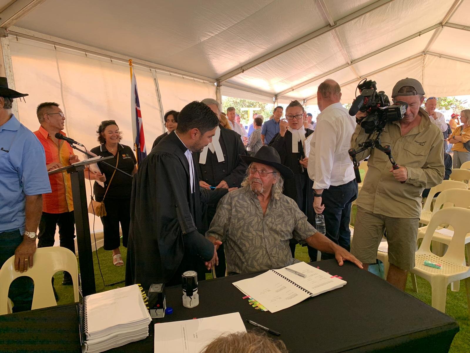 Michael Pagsanjan and Edward (Ted) Mullalley, following the execution of the landmark Indigenous Land Use Agreement.